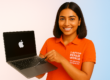 Certified technician repairing a MacBook at a customer's home in Hyderabad.